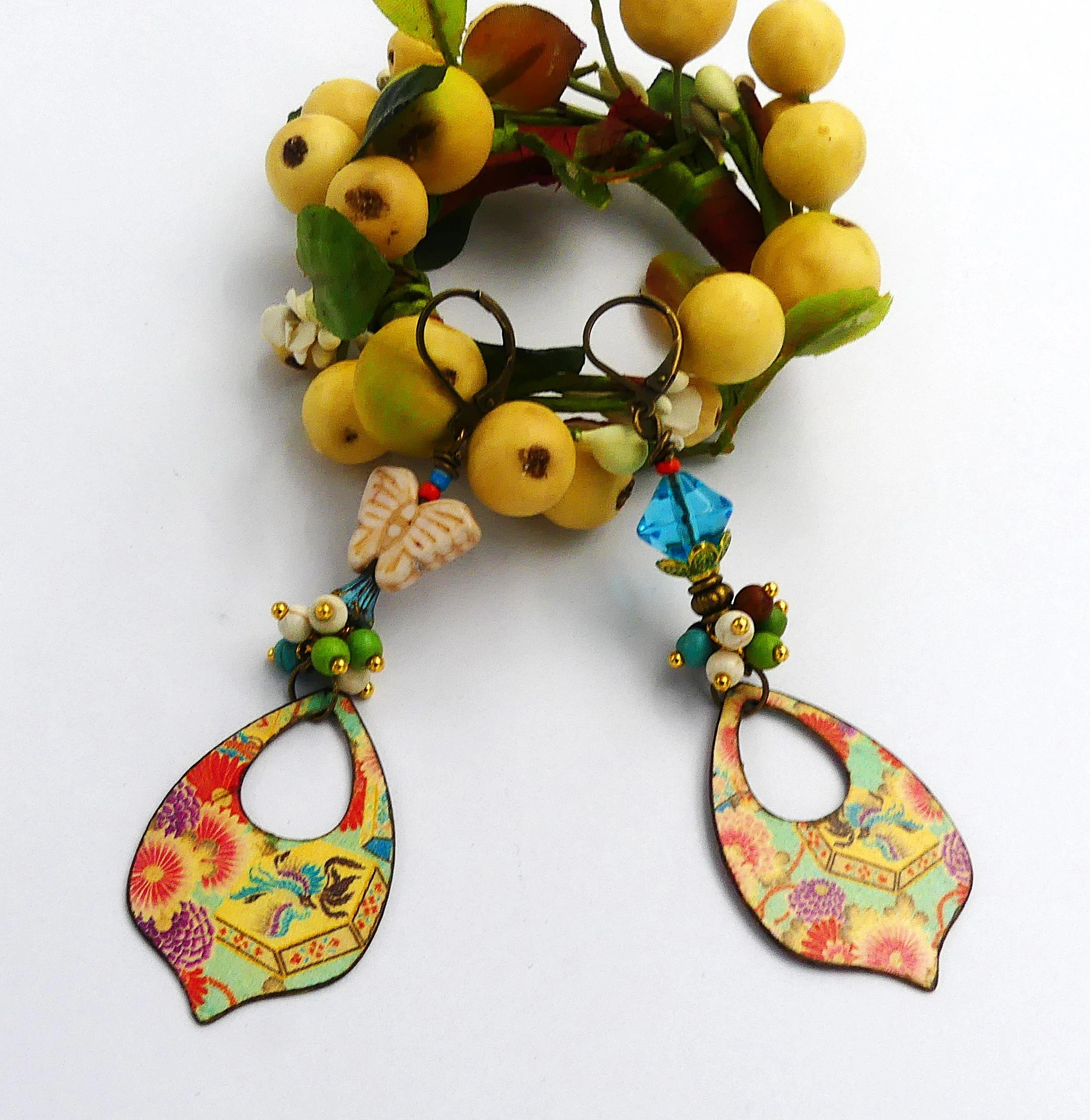 Boucles d'oreilles handmade, très bon état, impressions sur métal, verre, dissociées